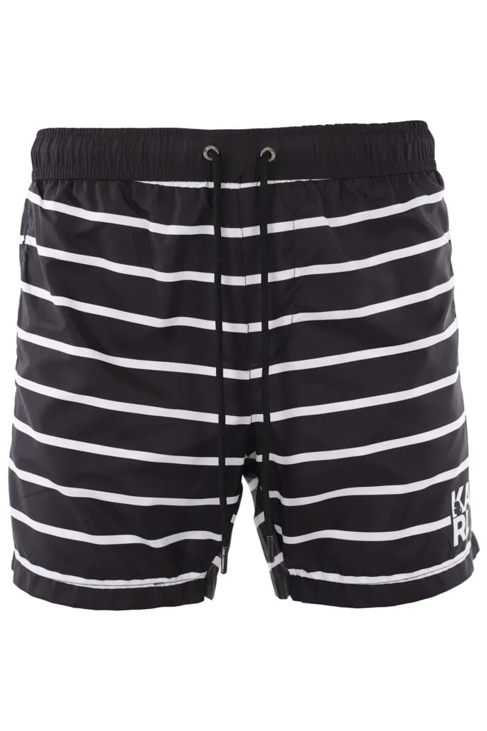 Bañador negro con líneas blancas y logo pequeño