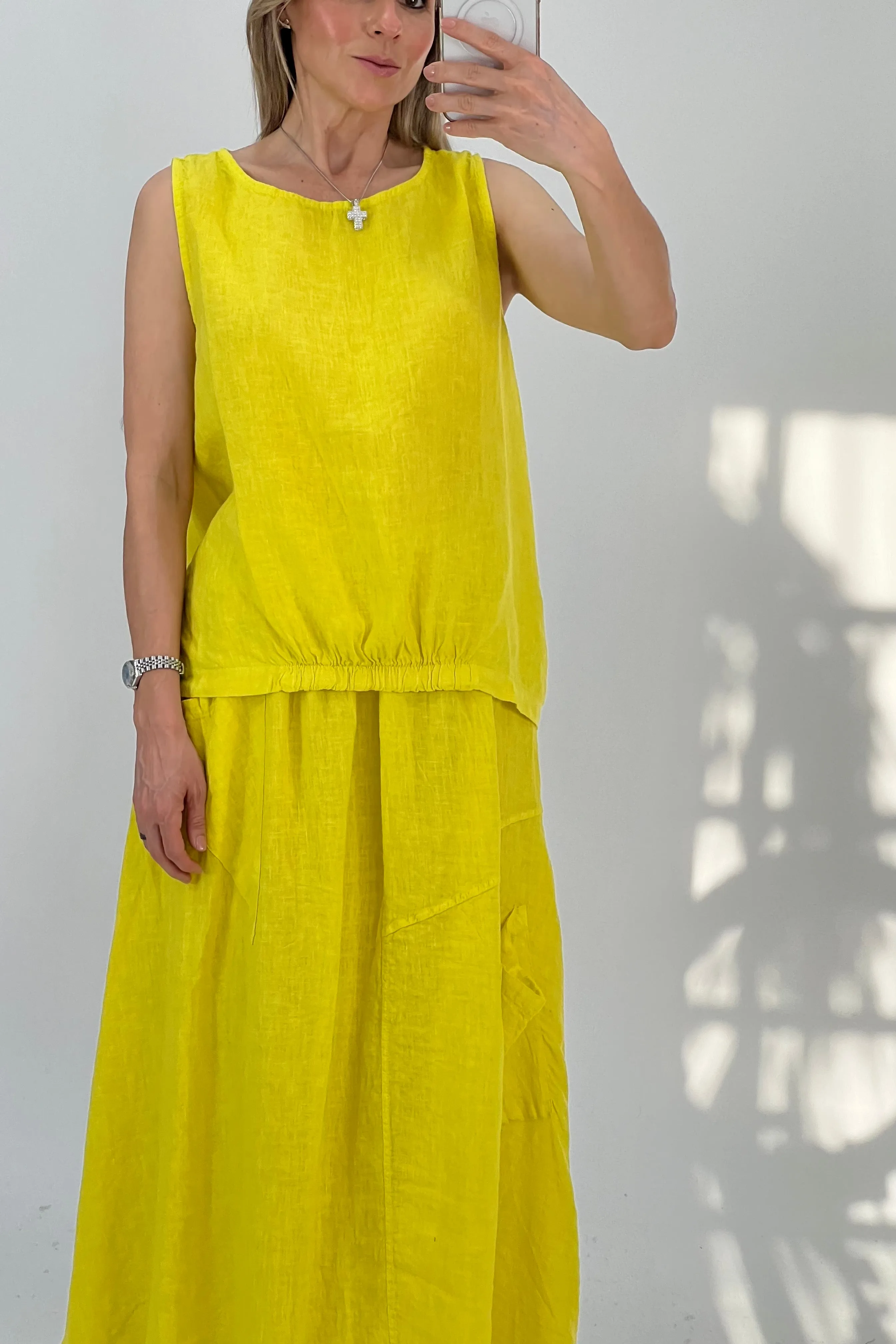 BLUSA BAJO ASIMTRICO