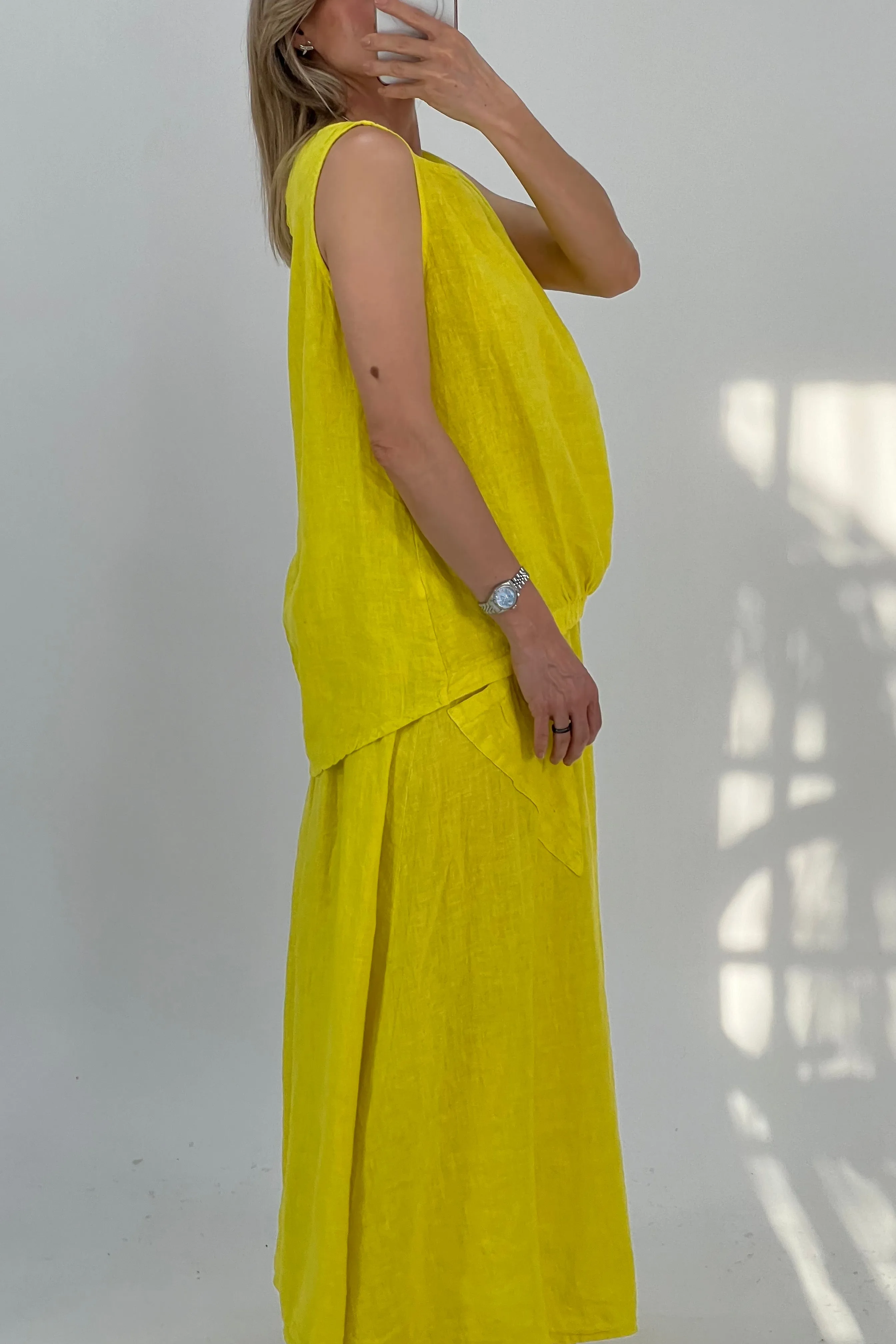 BLUSA BAJO ASIMTRICO