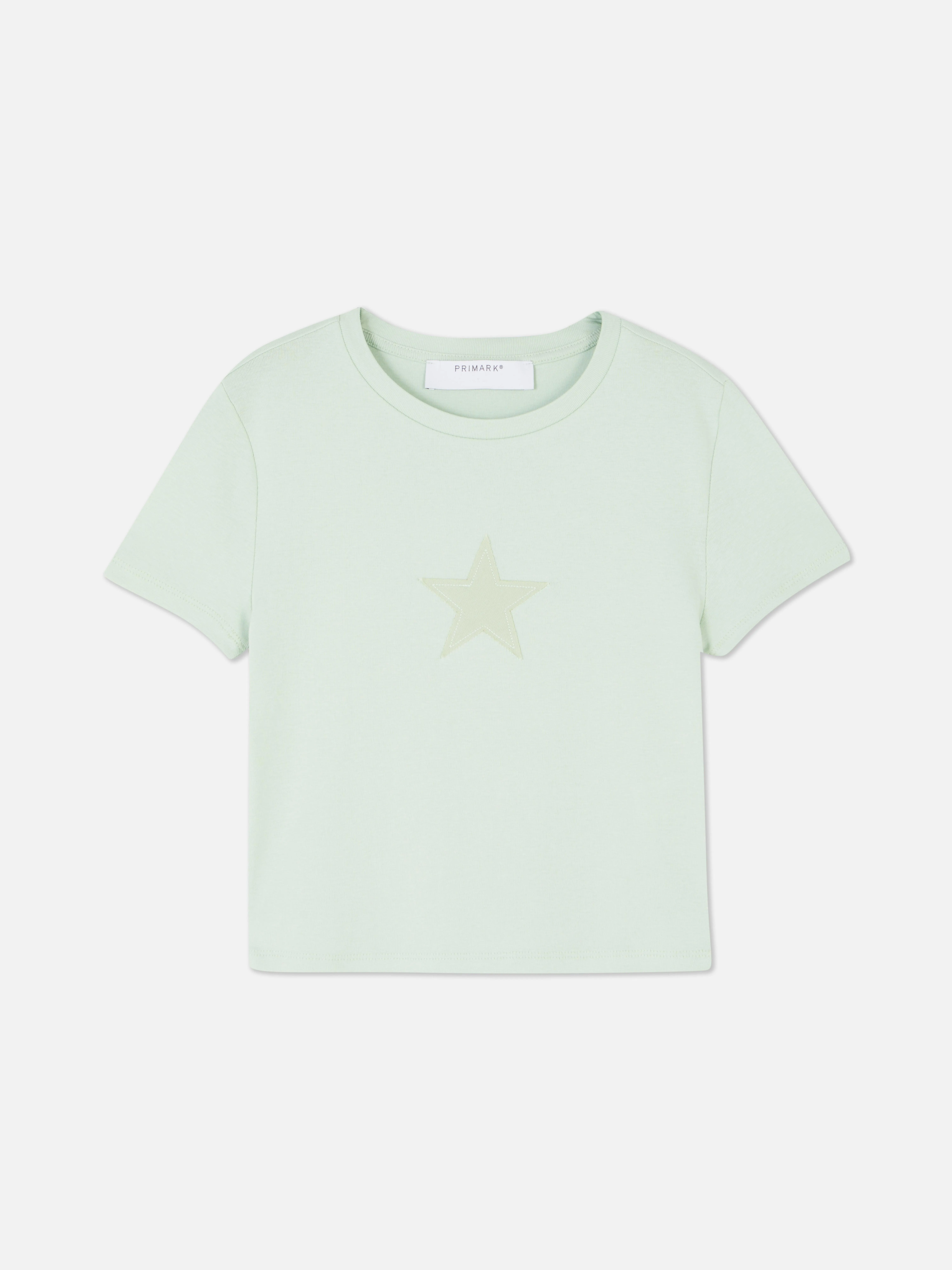 Camiseta corta tipo bebé con parche