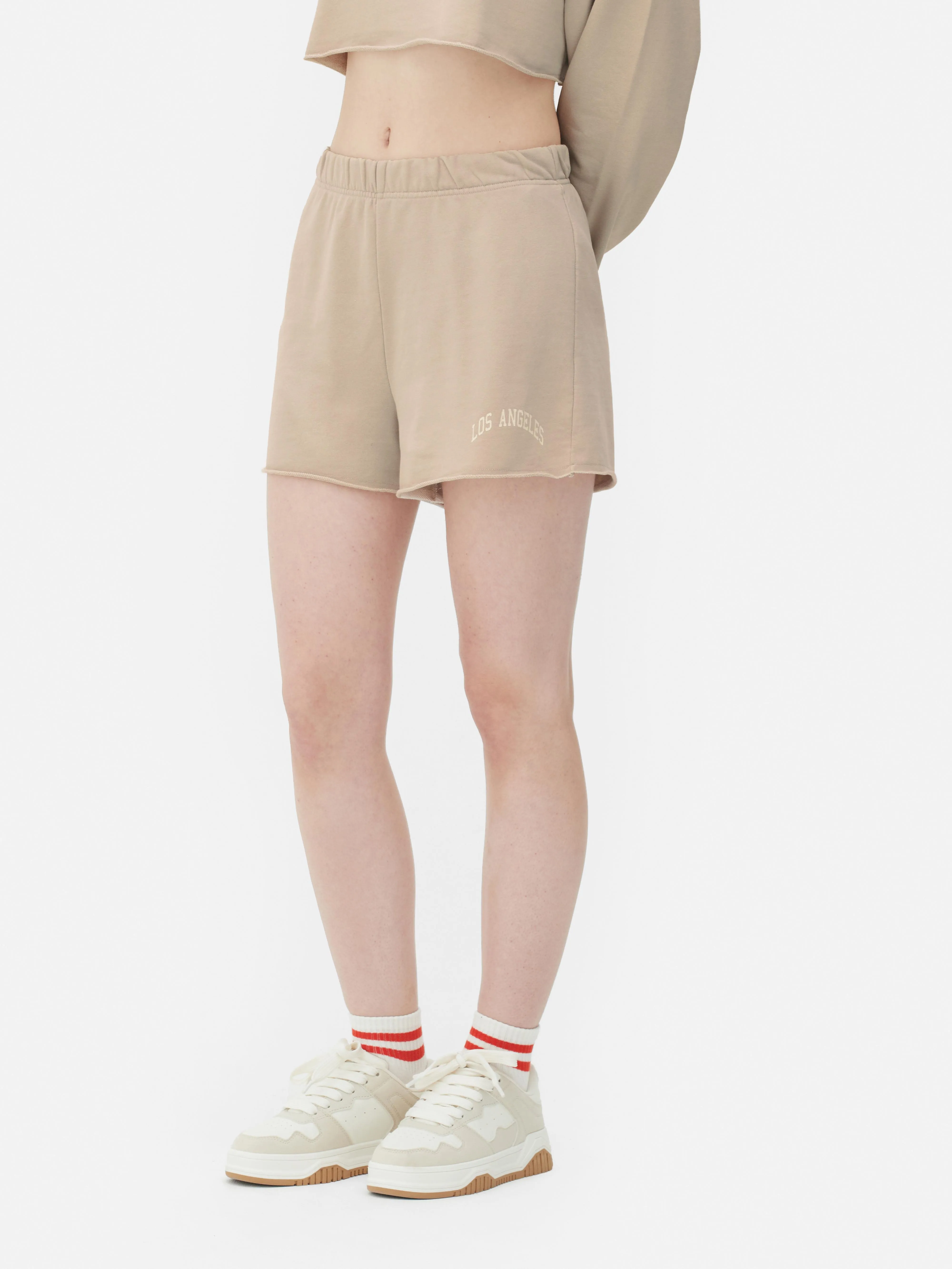 Pantalones cortos combinables con bajo sin rematar