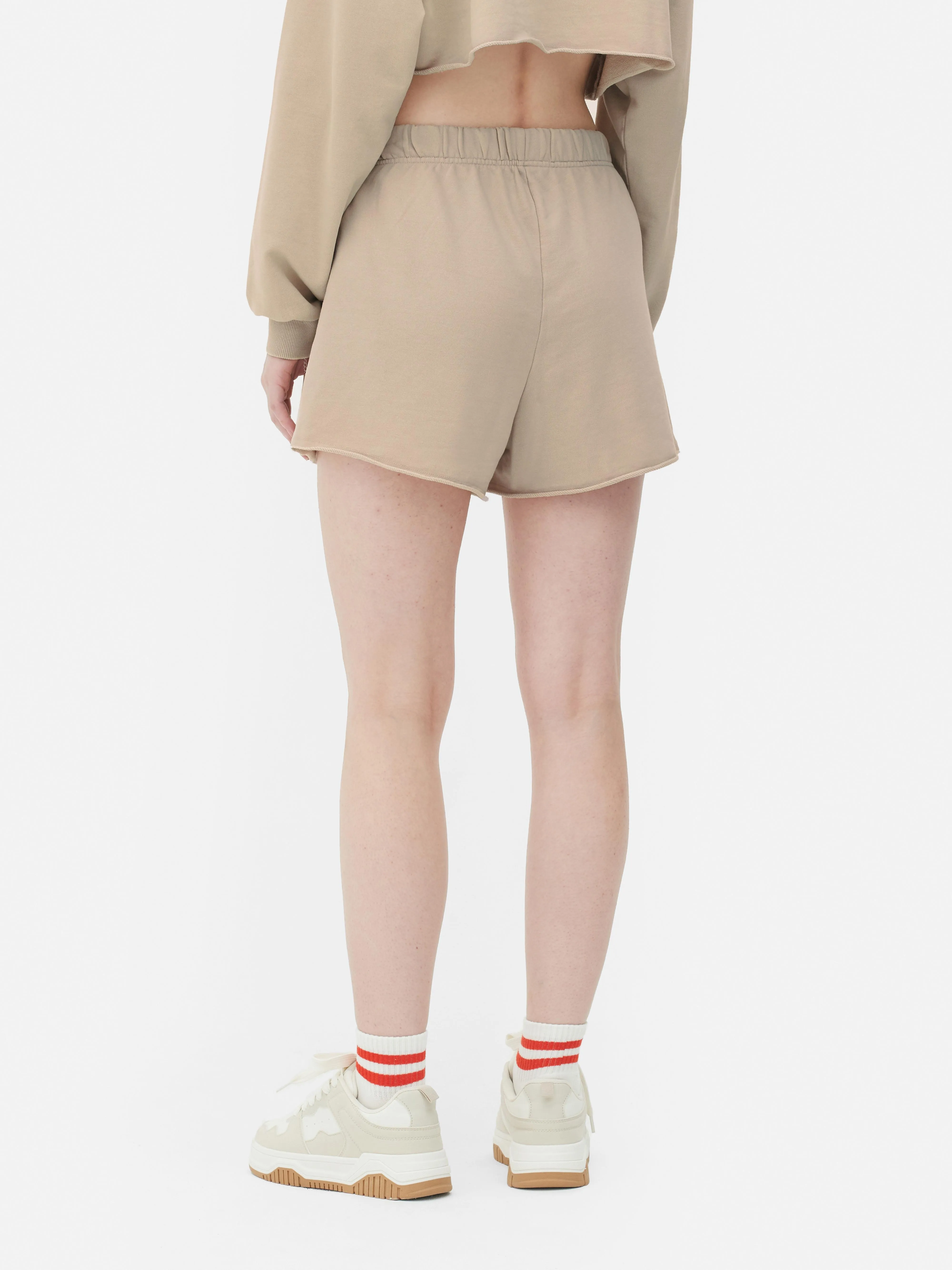 Pantalones cortos combinables con bajo sin rematar