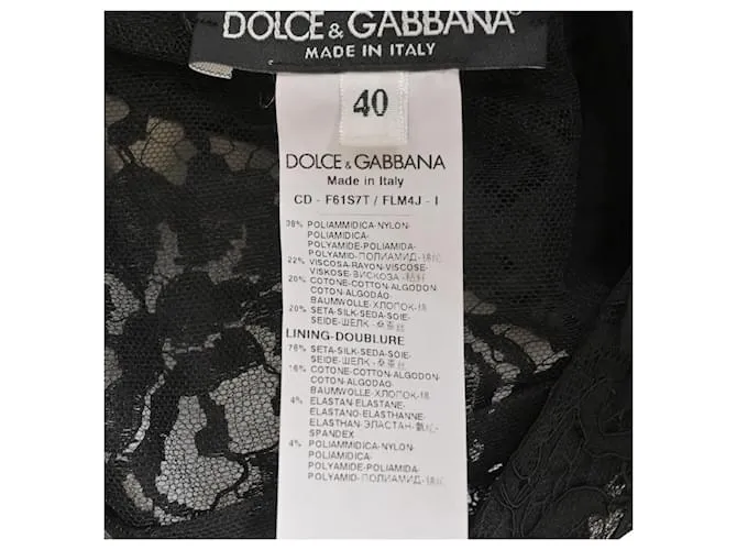 Vestido midi de encaje negro con detalle de lazo y volantes de Dolce & Gabbana en poliamida 