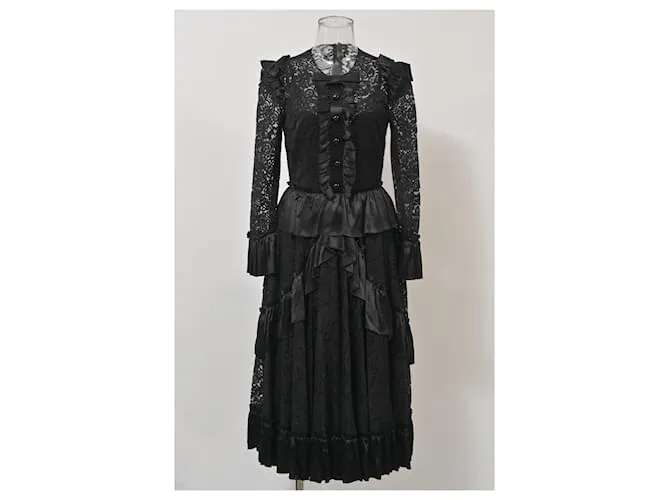 Vestido midi de encaje negro con detalle de lazo y volantes de Dolce & Gabbana en poliamida 